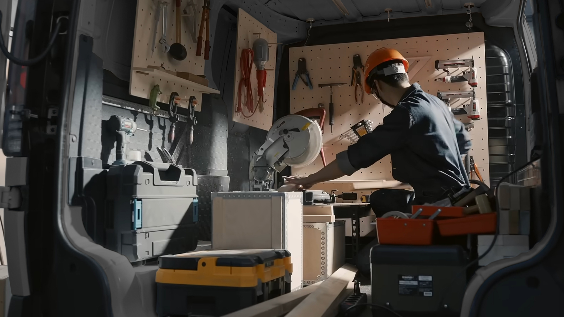 The Kia PV5 Cargo interior converted into mobile workshop with tools and equipment